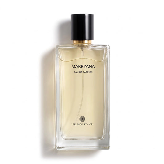 Marryana Eau de Parfum by ESSENCE ETHICS in a clear glass bottle with pale golden liquid and a black cap on a white background.