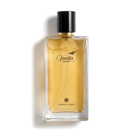 Vanilla Coffee perfume by ESSENCE ETHICS in a clear glass bottle with golden liquid and a black cap on a white background.