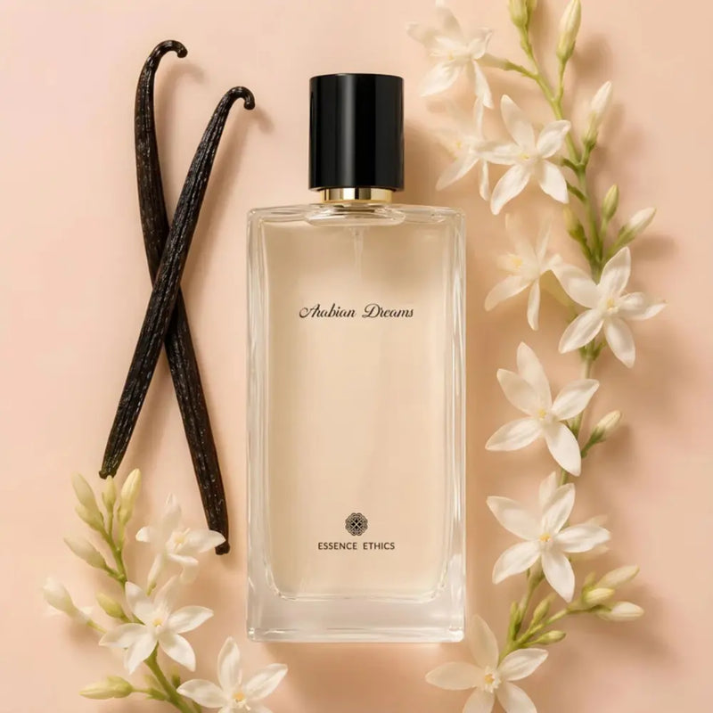 Perfume bottle labeled 'Alrabian Dreams' with vanilla beans and flowers on a beige background