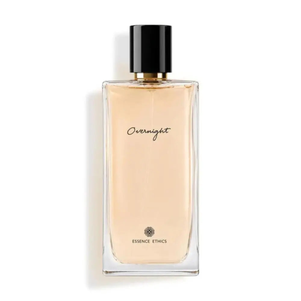 Perfume bottle labeled 'Overnight' by Essence Ethics on a white background