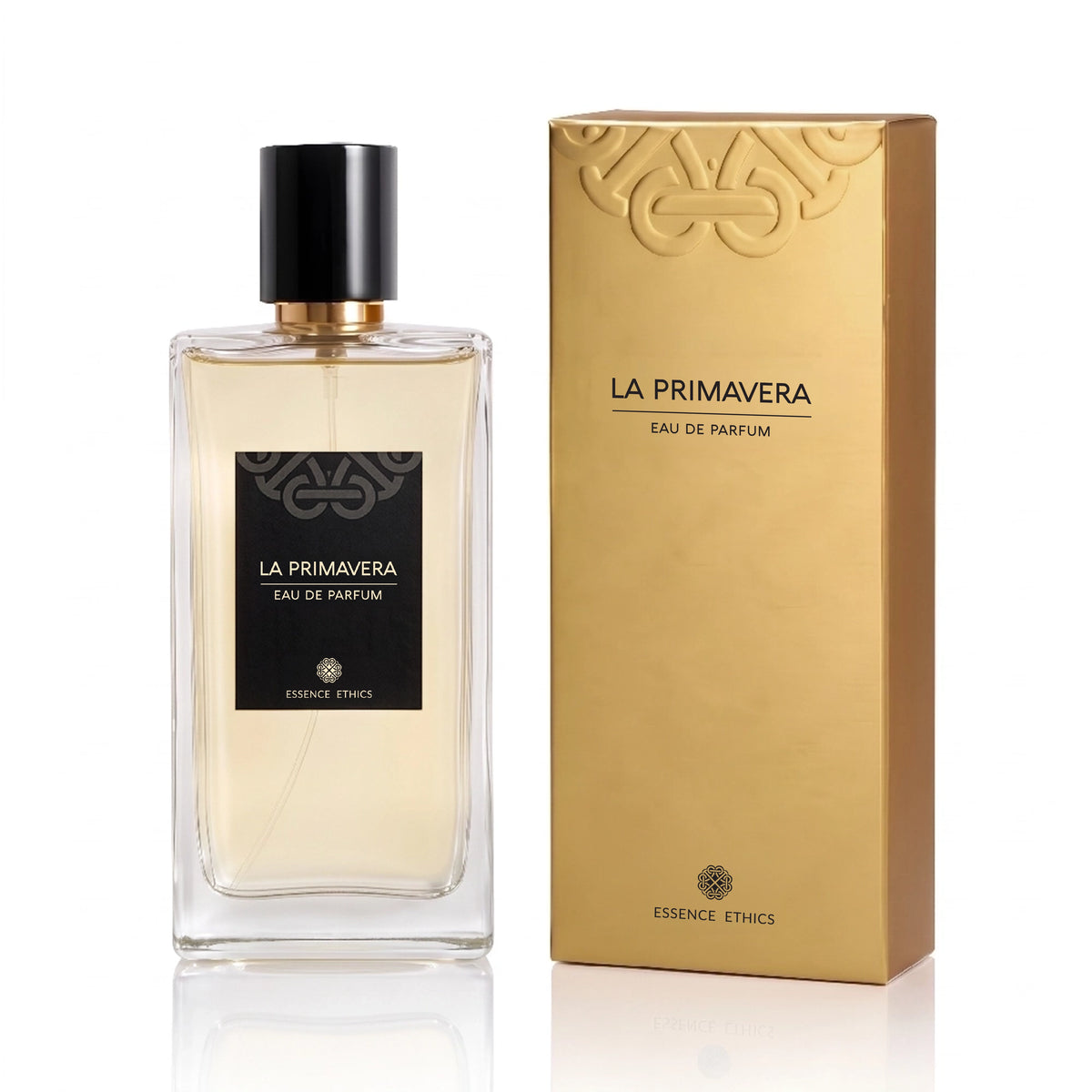 La Primavera Eau de Parfum by ESSENCE ETHICS in a clear glass bottle beside its gold presentation box on a white background.